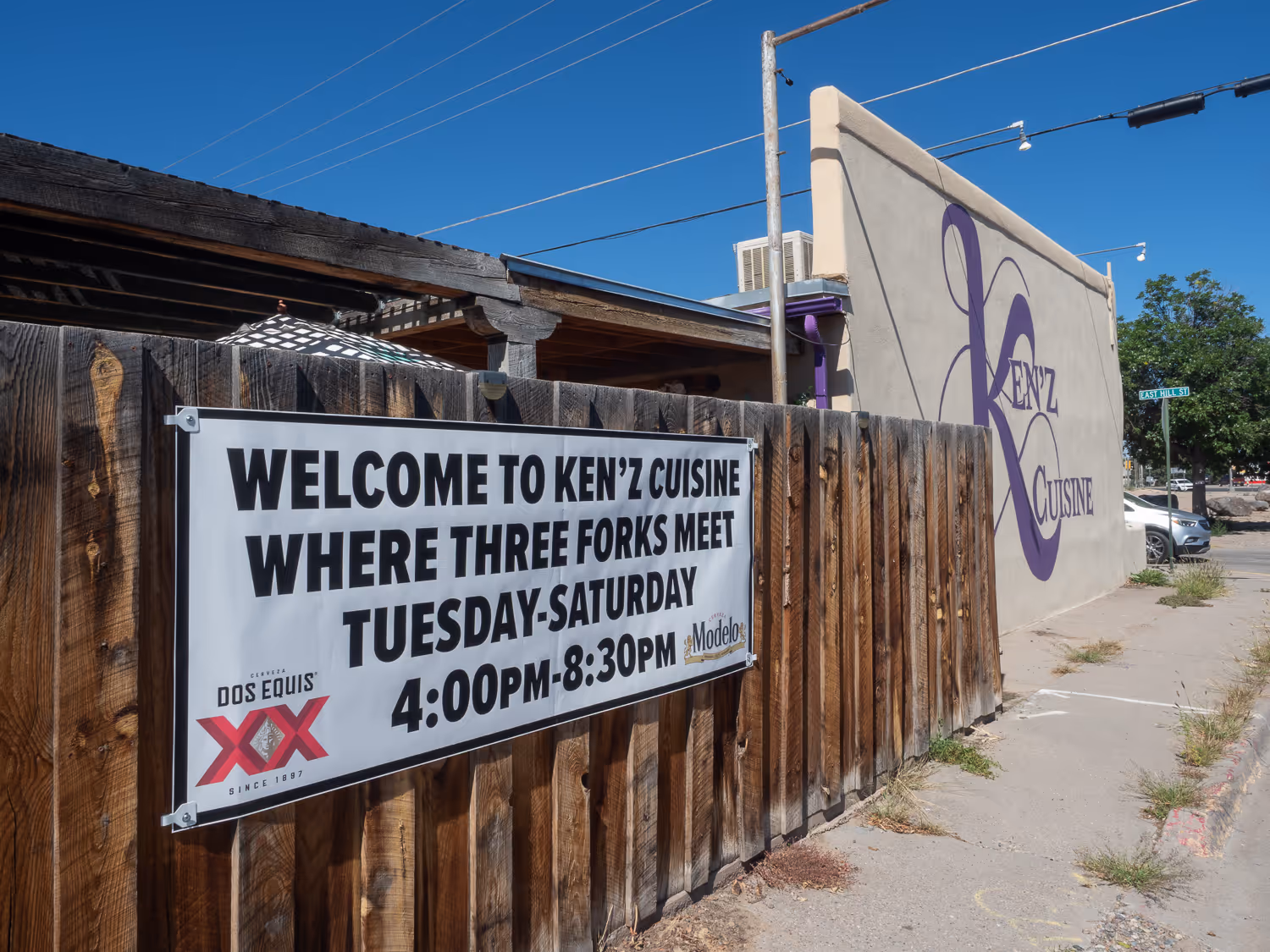 Fence banner: Welcome to Ken'z Cuisine, Where Three Forks Meet, Tuesday-Saturday 4:00pm-8:30pm